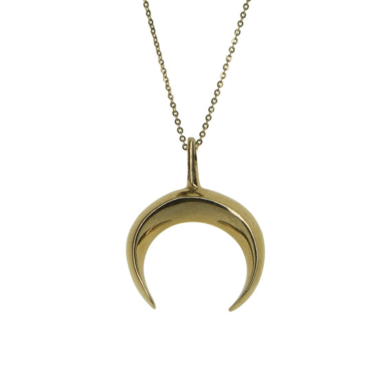 luan lunica pendant gold on a gold chain